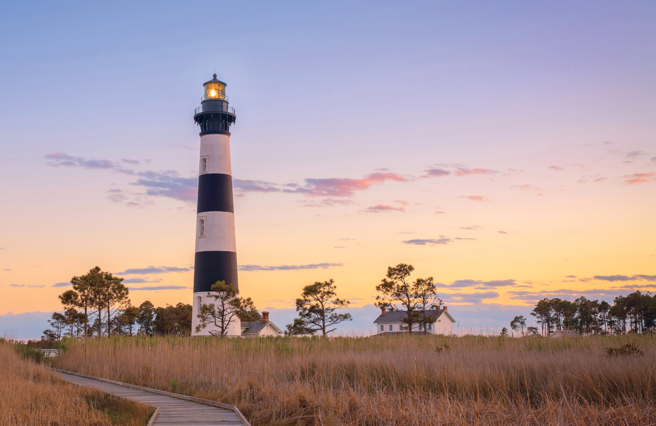 sunset with lighthouse in north carolina